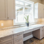 custom Taupe laundry room cabinetry