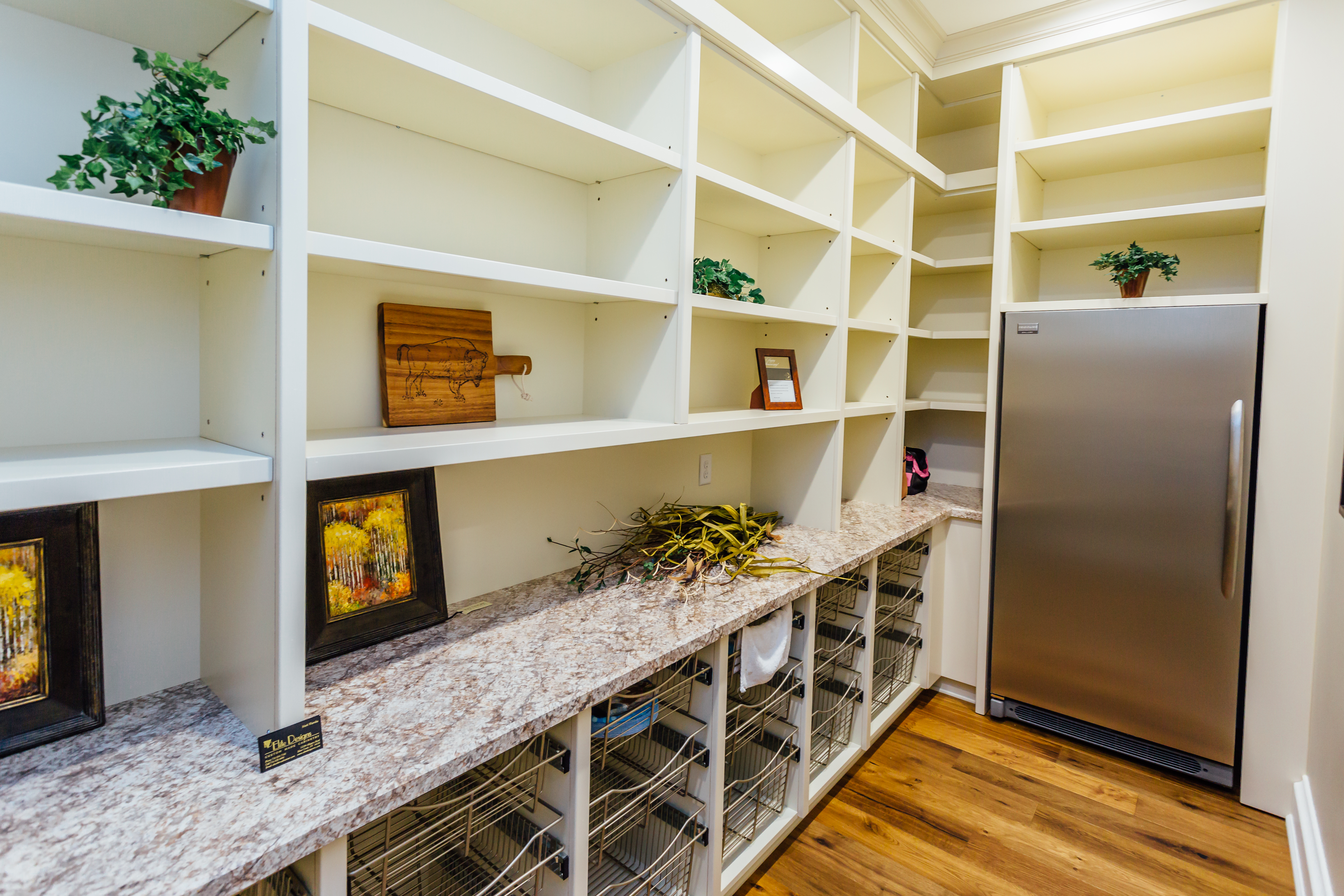 Taupe custom kitchen with wood island and large pantry - Buffalo & wny family owned cabinetry & millwork #pantry #kitcheninspiration #storage 