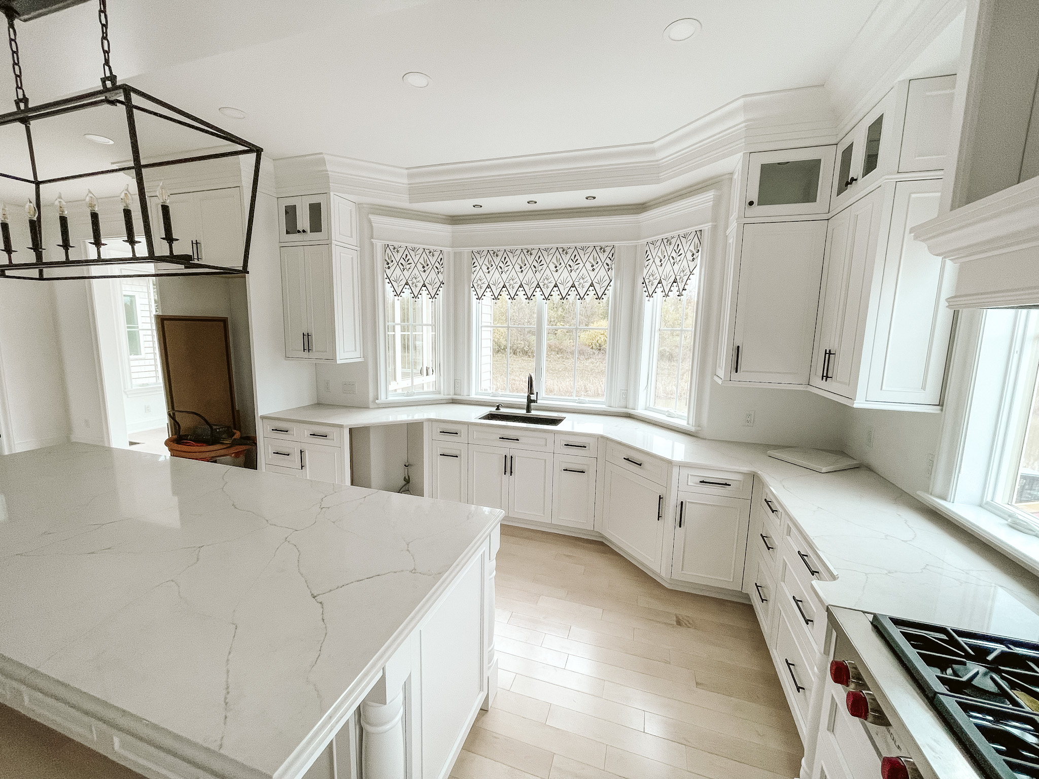 white painted kitchen with island
