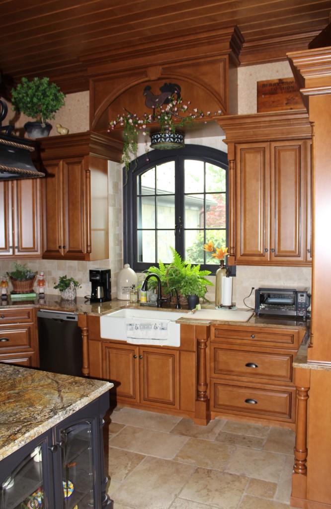 Custom Painted Kitchen - with french blue china hutch, granite countertops, light soffit, crystal chandeliers , wood bar, storage, refrigerator door