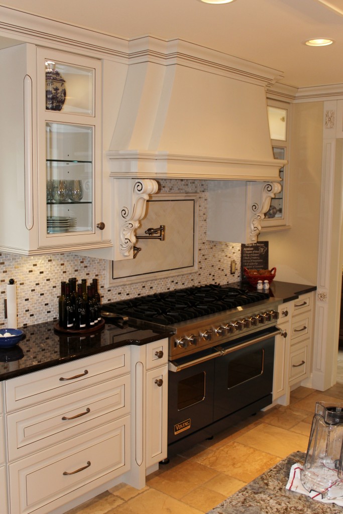 Custom Painted Kitchen - with french blue china hutch, granite countertops, light soffit, crystal chandeliers , wood bar, storage, refrigerator door