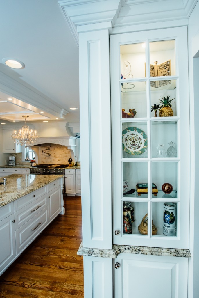 Custom Painted Kitchen - with french blue china hutch, granite countertops, light soffit, crystal chandeliers , wood bar, storage, refrigerator door