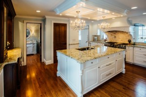 Custom Painted Kitchen - with french blue china hutch, granite countertops, light soffit, crystal chandeliers