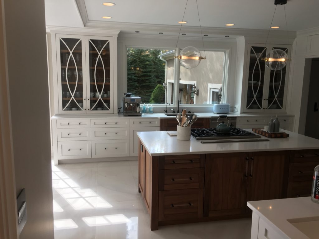 Custom Painted Kitchen - with french blue china hutch, granite countertops, light soffit, crystal chandeliers , wood bar, storage, refrigerator door