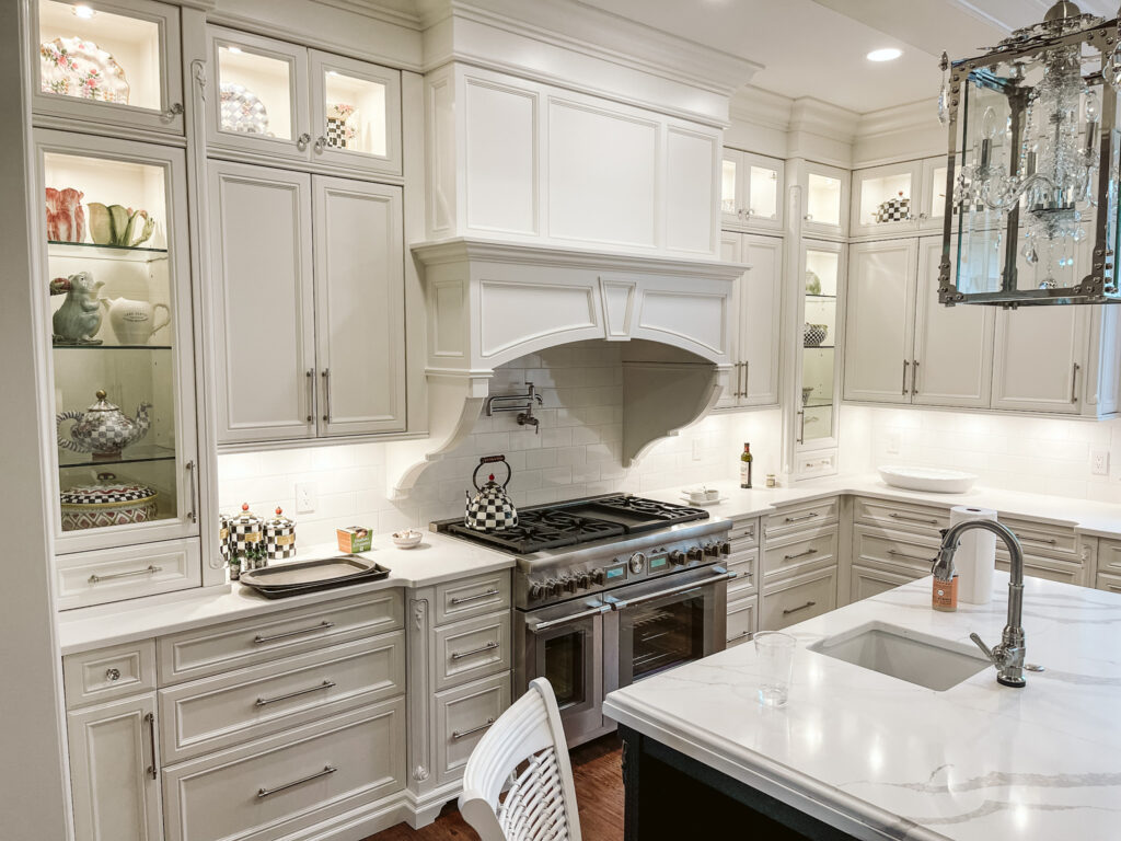 custom white painted kitchen with black island