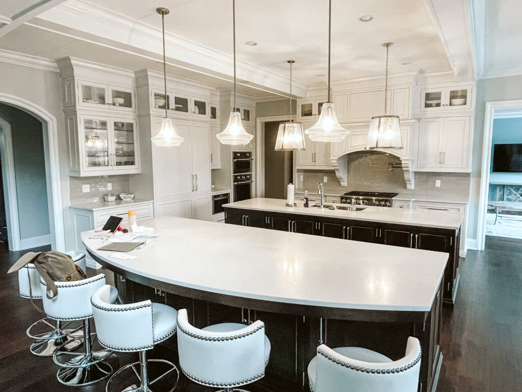 Double wood island kitchen with painted white cabinetry