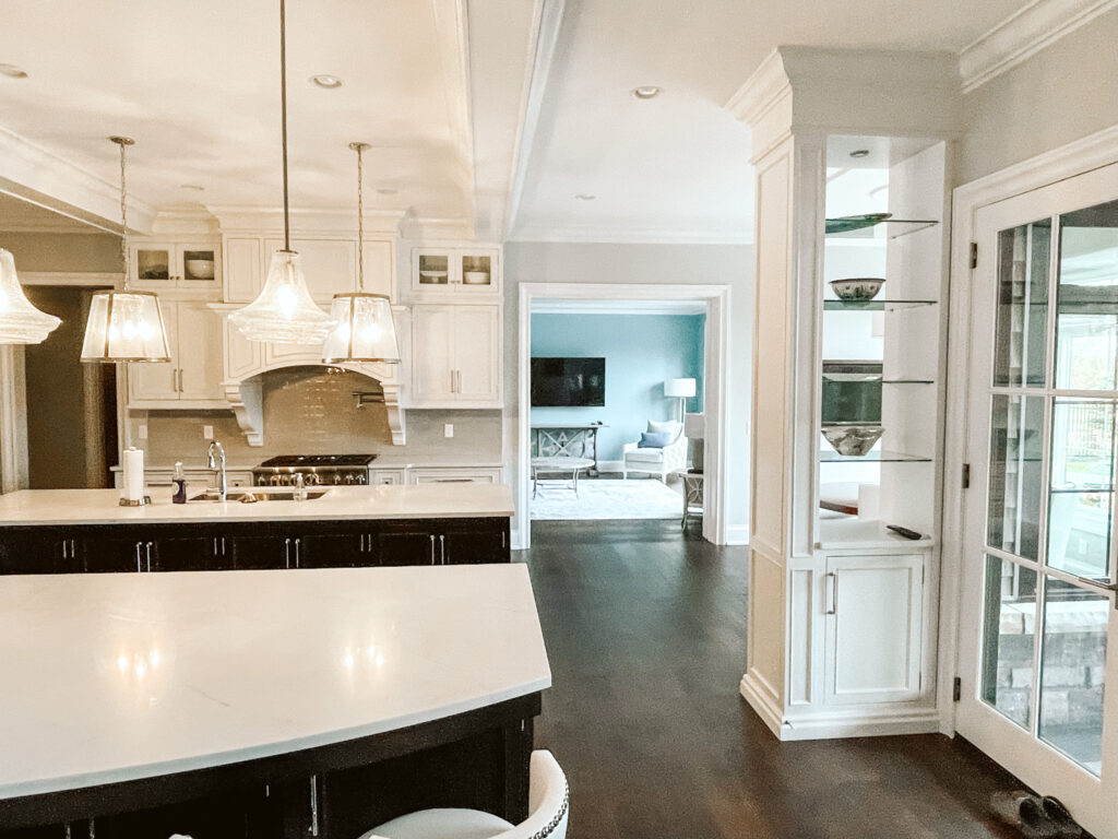 Double wood island kitchen with painted white cabinetry