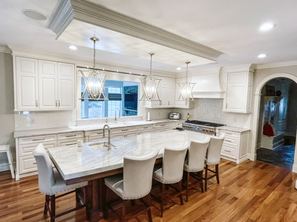 custom white kitchen with light soffit